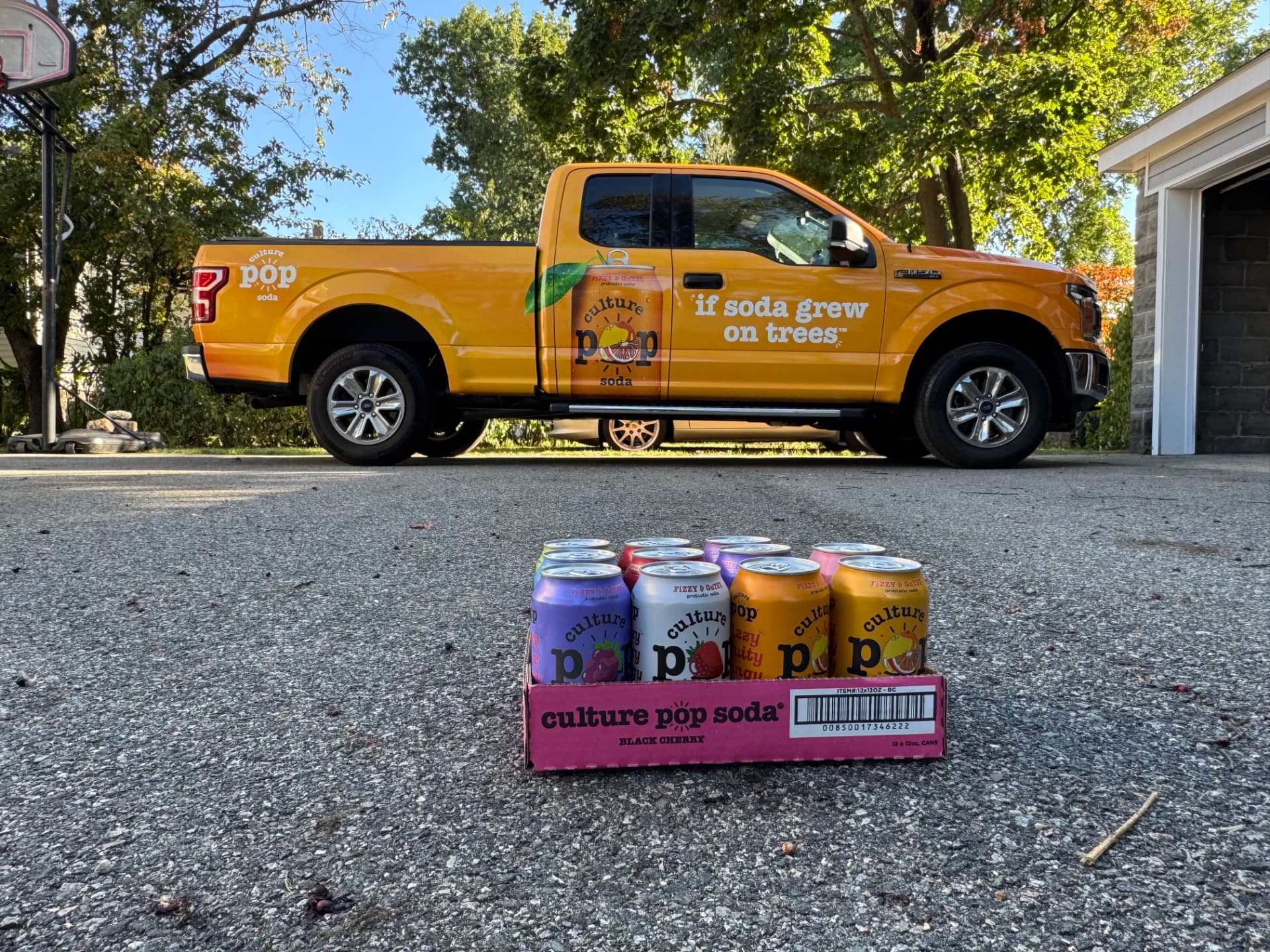 Orange Culture Pop Soda pickup truck wrap