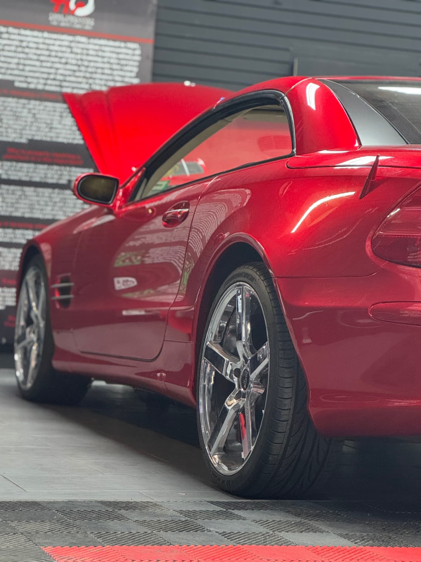 Mercedes SL rear quarter finished in a gloss red color change wrap