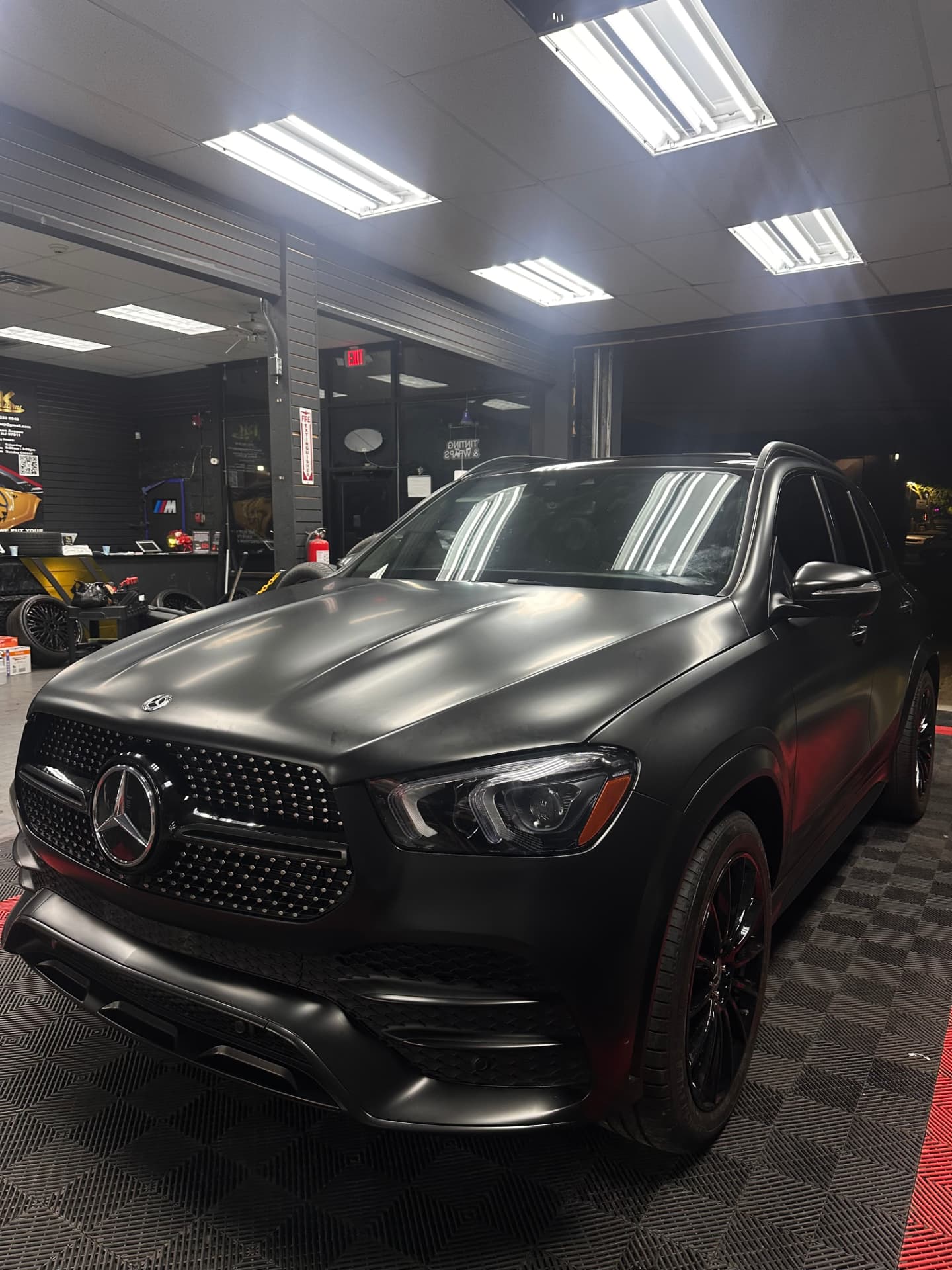 Mercedes GLE finished in a satin black color change wrap